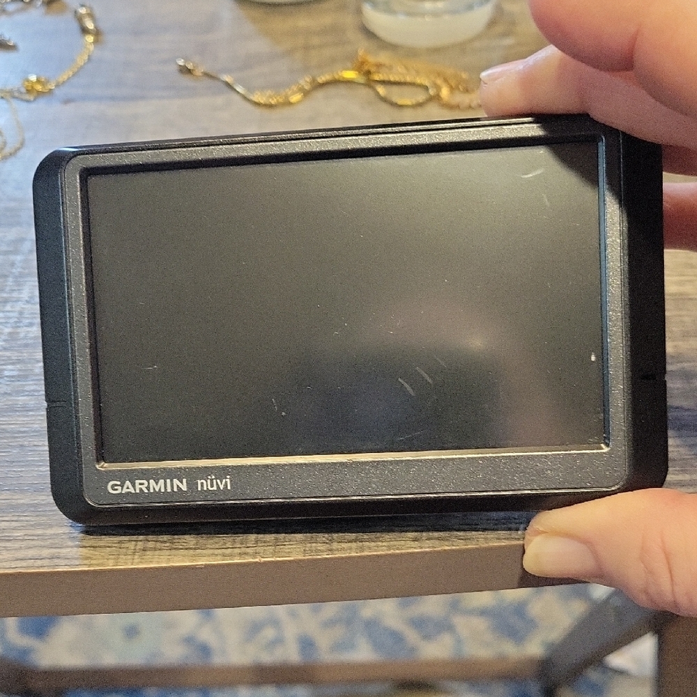 5 For 25.00/Garmin Nuvi Device Does Everything!!Good Cond.